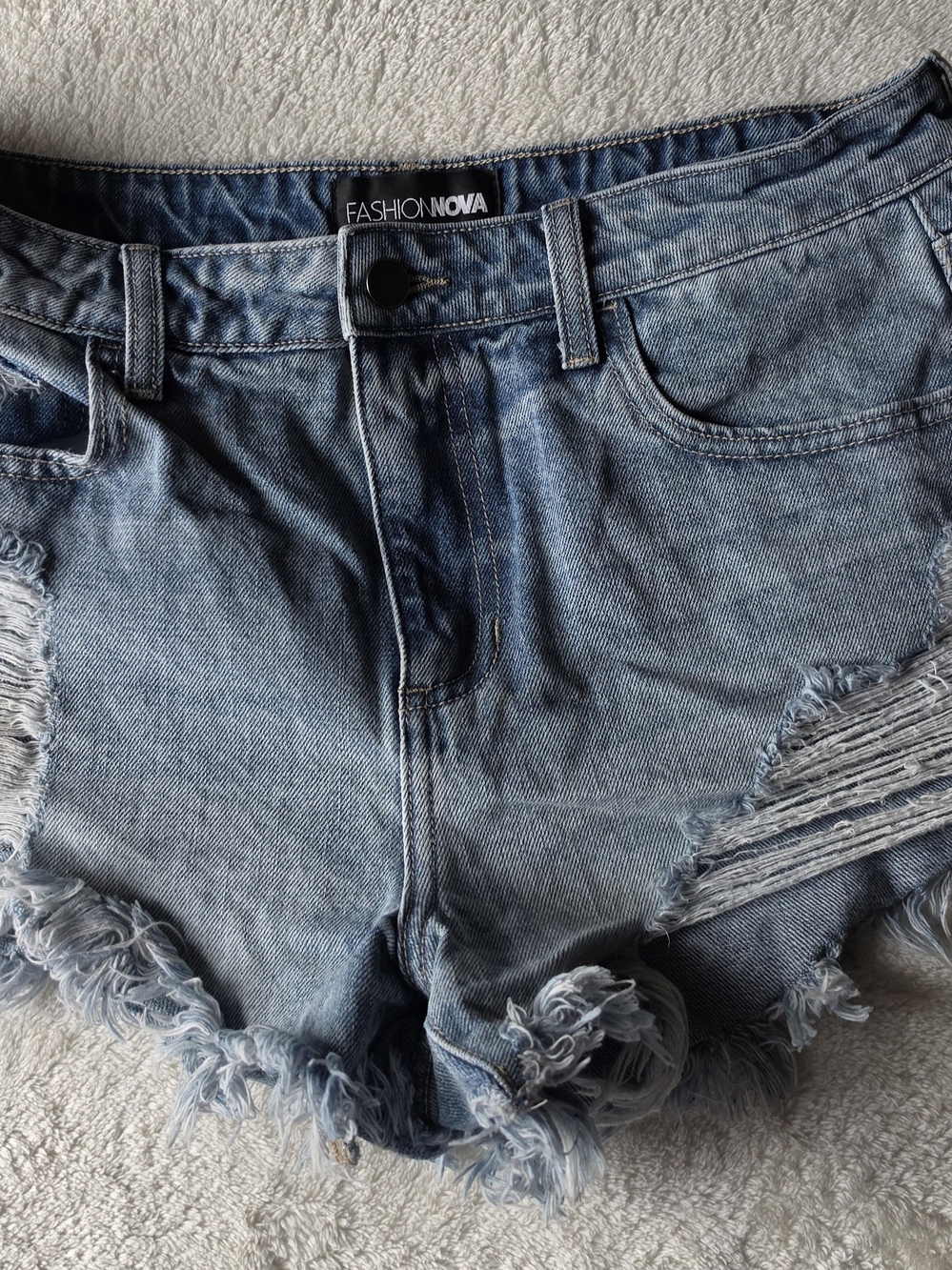 Fashion Nova Light Wash Distressed Denim Cutoffs